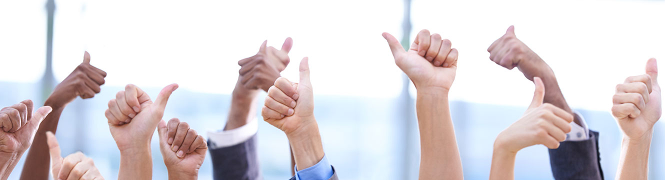 business people's hands, giving thumbs up in the air